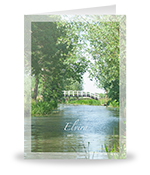 Wit bruggetje aan water