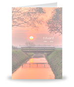 Brug over sloot, ondergaande zon