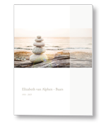 Rouwkaart met stenen op het strand