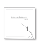 Rouwkaart met vogel op tak
