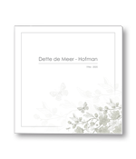 Rouwkaart met vlinder op bloementak