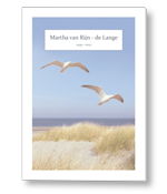 Rouwkaart met meeuwen op het strand