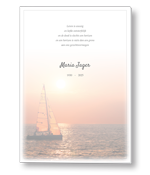 Rouwkaart met zeilboot op zee